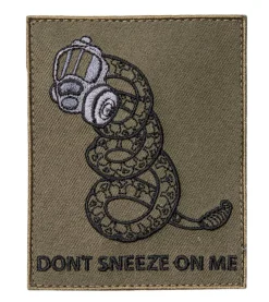 Varusteleka Don't Sneeze on Me moraalimerkki